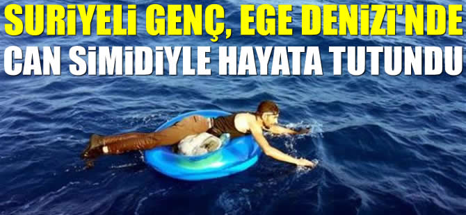 Suriyeli genç, Ege Denizi'nde can simiyle hayata tutundu